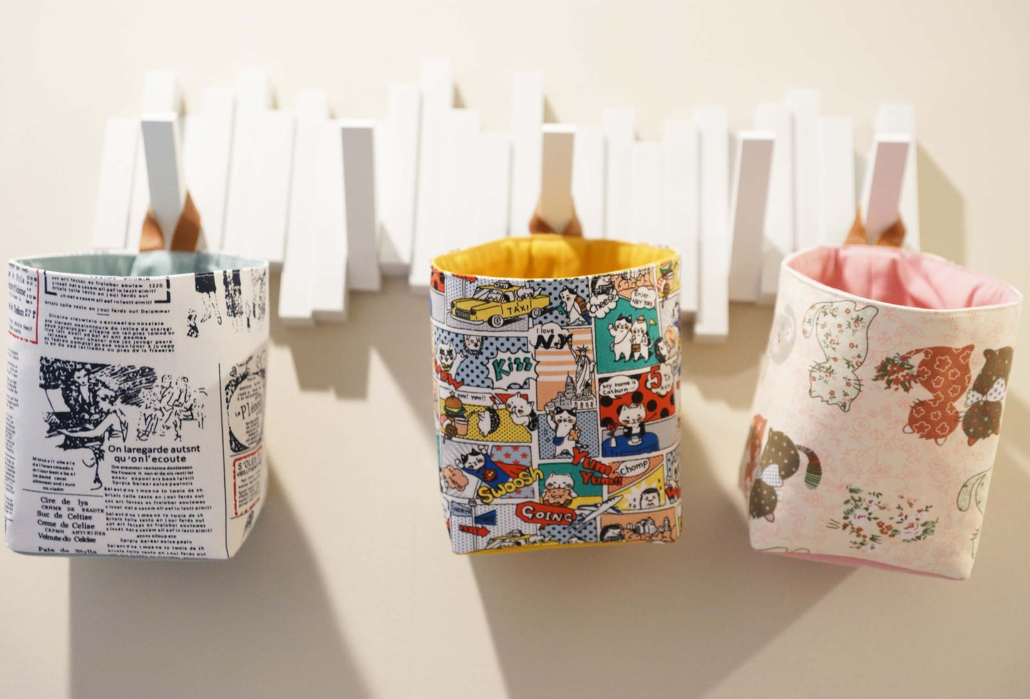 Newspaper Words Fabric Basket with Leather Hang Loop